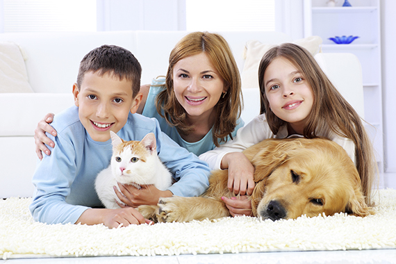 family with dog on carpet.jpg